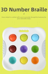 Detail of baby sensory board with 3D braille numbers and colorful silicone push bubbles