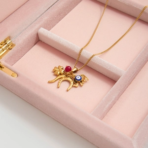 18K gold plated stainless steel necklace with evil eye and horseshoe charms in a gift box