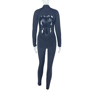 Detail of black long-sleeve bodysuit featuring a unique heart-shaped cutout on the back