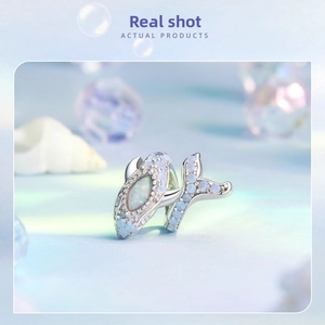 Detailed macro view of S925 silver blue opal whale charm bead for DIY bracelets
