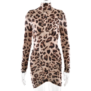 Detail of high collar leopard print dress with ruching accents on waist and skirt
