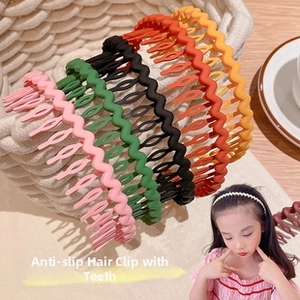 Detail view of colorful wavy headbands with inner teeth for secure non-slip hair styling