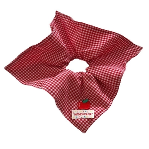 Floral plaid hair scrunchie with red checks and cute apple embroidery on white background