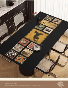 Detail of waterproof leather placemat with vintage floral and leopard prints for table protection