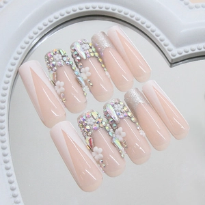 Sparkling floral press-on nails with AB rhinestones and silver glitter in ballet style