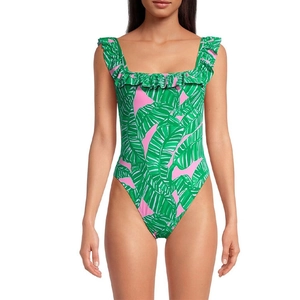 Detail of square neck ruffle trim and tropical leaf print on pink one-piece swimsuit