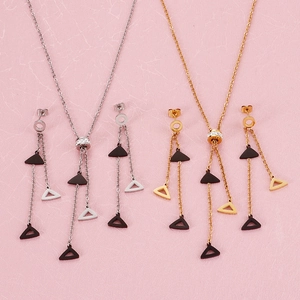 Silver and gold stainless steel long tassel jewelry sets with black triangle pendants