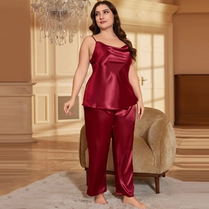 Burgundy silk satin two-piece pajama set with camisole top and wide-leg trousers