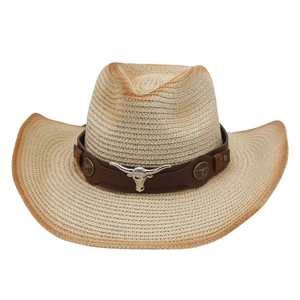 Beige straw cowboy hat with a metal bull skull ornament and wide brim for sun protection