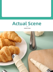 Macro shot of stainless steel conical croissant molds on a mint green baking background
