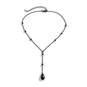 Detailed view of Gothic black Y-shaped necklace with faceted beads and water drop pendant