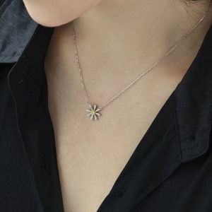 Exquisite S925 silver daisy necklace with white zircon petals and yellow gemstone center