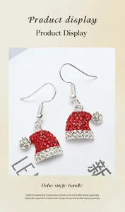 Detail of Christmas hat earrings featuring sparkling red and white crystal rhinestones