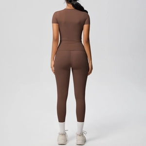 Women's two-piece fitness yoga set in dark coffee color with slim-fit top and high-waist leggings