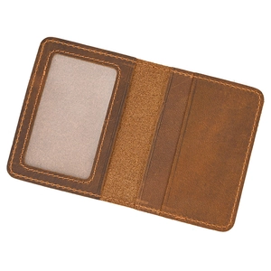 Detail view of genuine leather card holder with ID window and vertical card slots