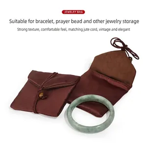Classic dark brown jewelry storage pouch with drawstring for bracelets and necklaces