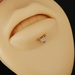 G23 titanium clover labret stud with pavé zircon worn on a silicone lip model