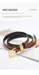 Detailed view of women's dark brown croc-pattern leather belt with gold square buckle