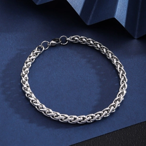 Detailed top view of a silver stainless steel Cuban link bracelet with lobster clasp