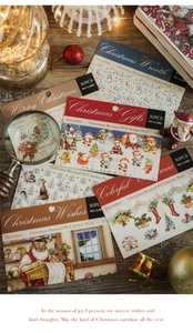 Détail d'autocollants de Noël vintage en PET avec dorure et illustrations festives