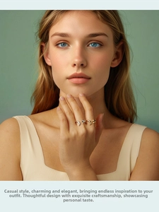 Close-up of a model wearing stylish gold and silver fox-inspired adjustable open rings