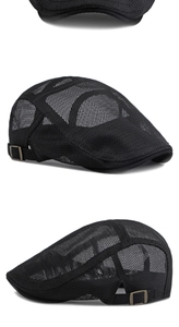 Detail view of black mesh ivy cap showing breathable texture and adjustable metal buckle