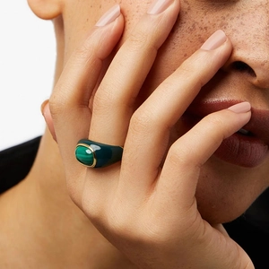 18k gold plated malachite ring with green glaze finish on hand model for women