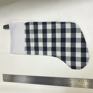 Detail view of black and white buffalo check Christmas stocking showing 45cm length scale