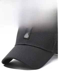 Close-up of black golf cap featuring a fabric patch with crossed clubs and mesh details