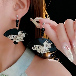 New Chinese style fan earrings with retro floral patterns and black beads on female model