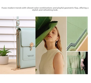 Detail of mint green crossbody phone bag with floral gold accent and multi-zipper layers