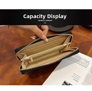 Internal view of black long wallet showing card slots and spacious compartments