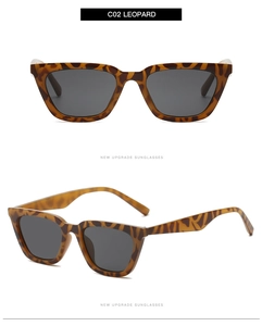 Detail view of leopard print frames and gray lenses on retro cat eye sunglasses