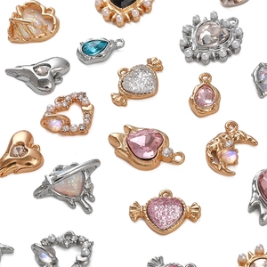 Assorted DIY alloy pendants with heart, moon, and planet shapes featuring crystals and pearls