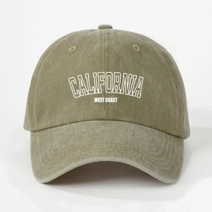 Detail of the embroidered California text on the washed cotton twill baseball cap
