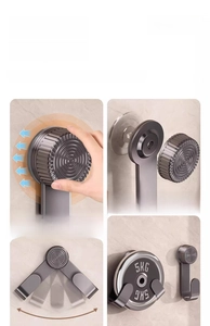 Close-up of wall-mounted suction cup lid holder with adjustable rotating hook