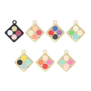 Set of seven square enamel charms with colorful quadrants and gold/black metal borders
