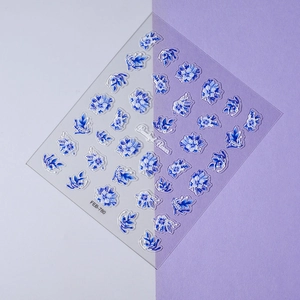 Macro detail of FEB-780 blue 5D embossed floral nail art stickers with textured flower petals