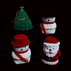Velvet Christmas jewelry boxes featuring Santa, snowman, and tree designs for storage