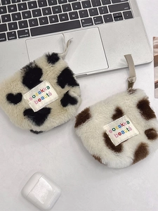 Mini plush pouch with cow and leopard print for earphones and lipstick storage