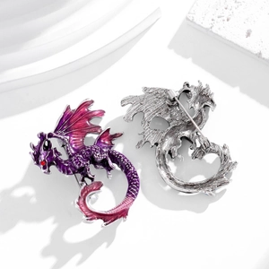 Exaggerated pterodactyl dragon brooch with purple enamel and silver metal back view