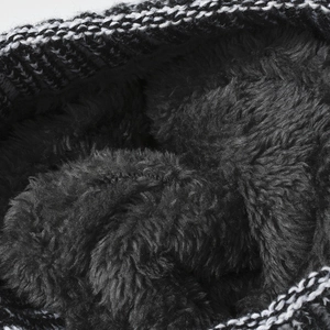 Winter fleece-lined beanie hat featuring thick knit exterior and warm thermal plush lining