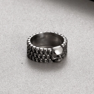 Detailed view of gothic skull ring with vintage oxidized finish on stainless steel