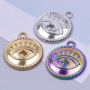 Three evil eye pendants in silver, gold, and rainbow finishes for DIY necklace making