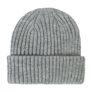Close-up of gray ribbed knit beanie showing textured wool blend fabric and folded cuff