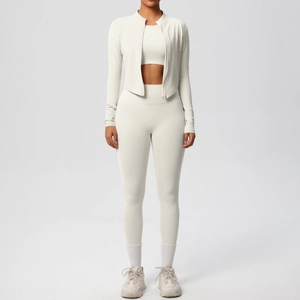 Three-piece cream white yoga set with high waist leggings and zip-up jacket details