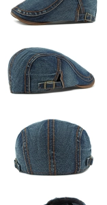 Detail of washed denim ivy cap featuring orange contrast stitching and bronze metal buckle
