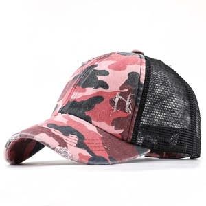 Distressed camo ponytail baseball hat with breathable black mesh and a pink camouflage front