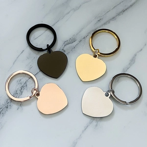 Polished heart-shaped stainless steel keyrings in black, gold, rose gold, and silver