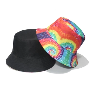 Detail showing high-quality cotton texture and stitching on colorful tie-dye bucket hats